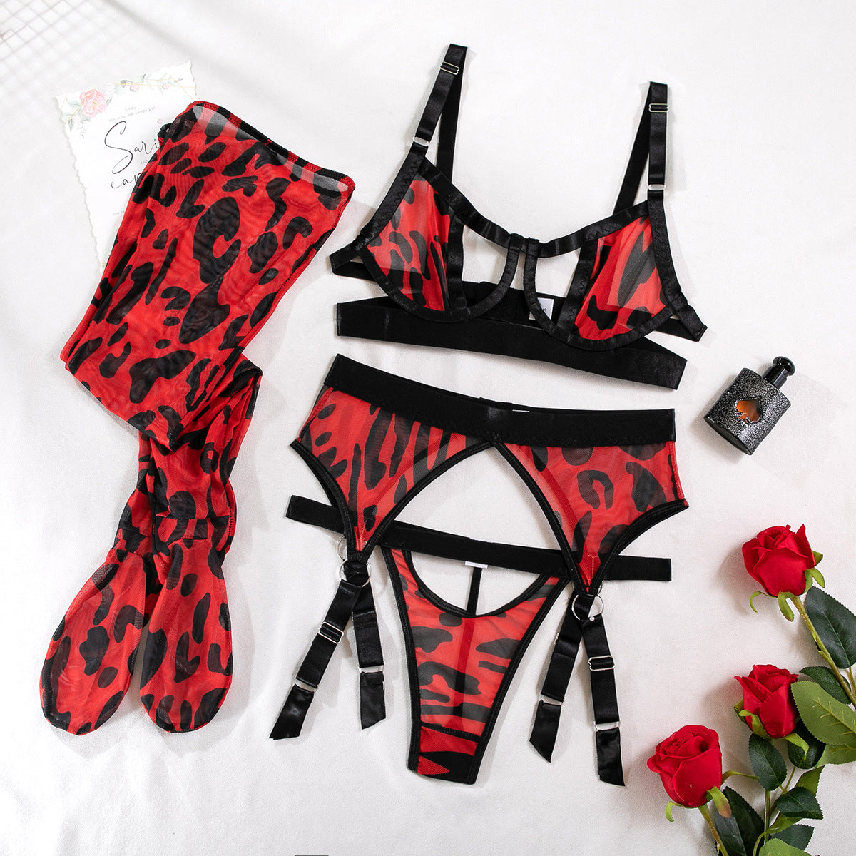 2023 Christmas new wild leopard print mesh hollow sexy lingerie four-piece set with stockings